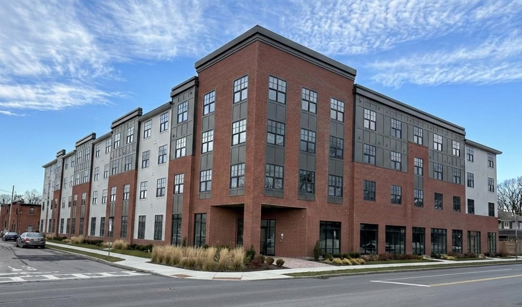 a building with a person standing in front of it