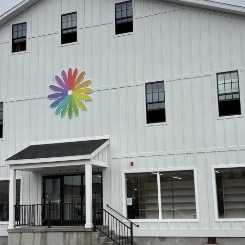a building with a kite on the roof